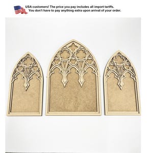 May include: Three light brown wooden cutouts shaped like pointed gothic arches. Each piece features intricate laser-cut tracery patterns at the top, including quatrefoil and trefoil motifs, set against a solid flat base panel with a smooth finish.