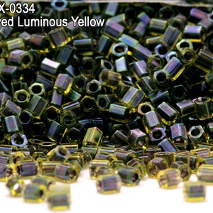 Hex-0334 , Miyuki Hexagon 2 Cut  11/0 , Inside Dyed Luminous Yellow . 10gr - 20gr - 100gr.