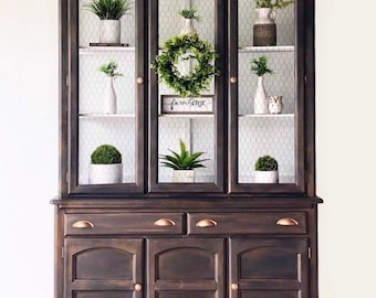Black modern rustic farmhouse style hutch china cabinet with gold hardware for dining area