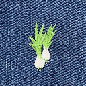 May include: A rustic wooden sign with the text "Welcome to our home" in white lettering. The sign features a distressed finish and a simple, inviting design, perfect for entryway decor.