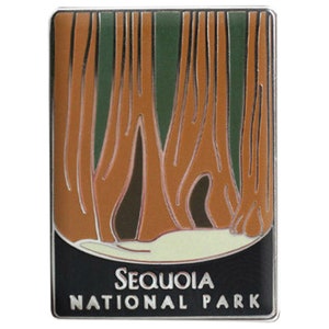 May include: Rectangular enamel pin featuring a stylized depiction of giant sequoia trees. The pin has a brown, green, and white color scheme with the words "Sequoia National Park" in white text on a black background.