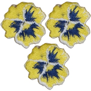 May include: Three yellow and blue embroidered pansy flower patches.