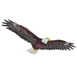 May include: Embroidered patch of a bald eagle in flight. The eagle has a white head, yellow beak, and brown and gray wings. The patch is designed to be sewn or ironed onto fabric.