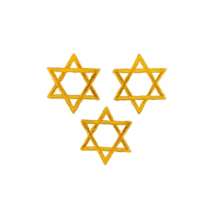 May include: Three embroidered patches, each shaped as a six-pointed Star of David. The patches are constructed with golden yellow thread, featuring a distinct stitched border and a hollow centre, arranged in a triangular formation against a white background.