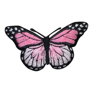 May include: Pink butterfly embroidered patch with black outlines and white accents. The butterfly has a detailed wing pattern.