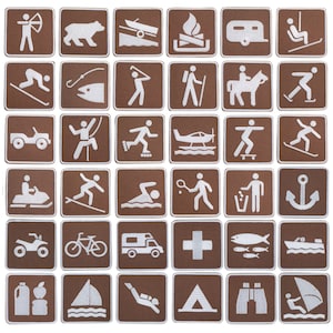May include: A set of 36 brown square stickers with white icons depicting various outdoor activities, including camping, fishing, hiking, boating, and more.