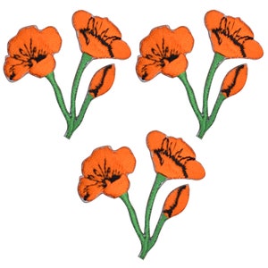 May include: Three iron-on patches featuring orange poppy flowers with green stems and leaves.