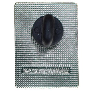 May include: The back of a silver pin with a black butterfly design. The pin has a safety clasp on the back.