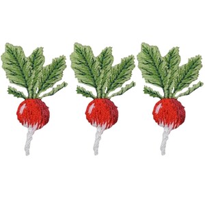 May include: Three embroidered red radishes with green leaves and white stems.