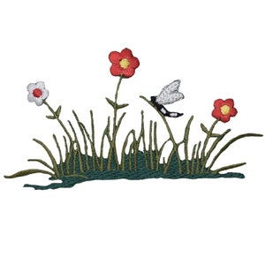May include: Embroidered patch featuring a dragonfly flying over green grass with three flowers. Two of the flowers are red with yellow centers and one is white with a red center.