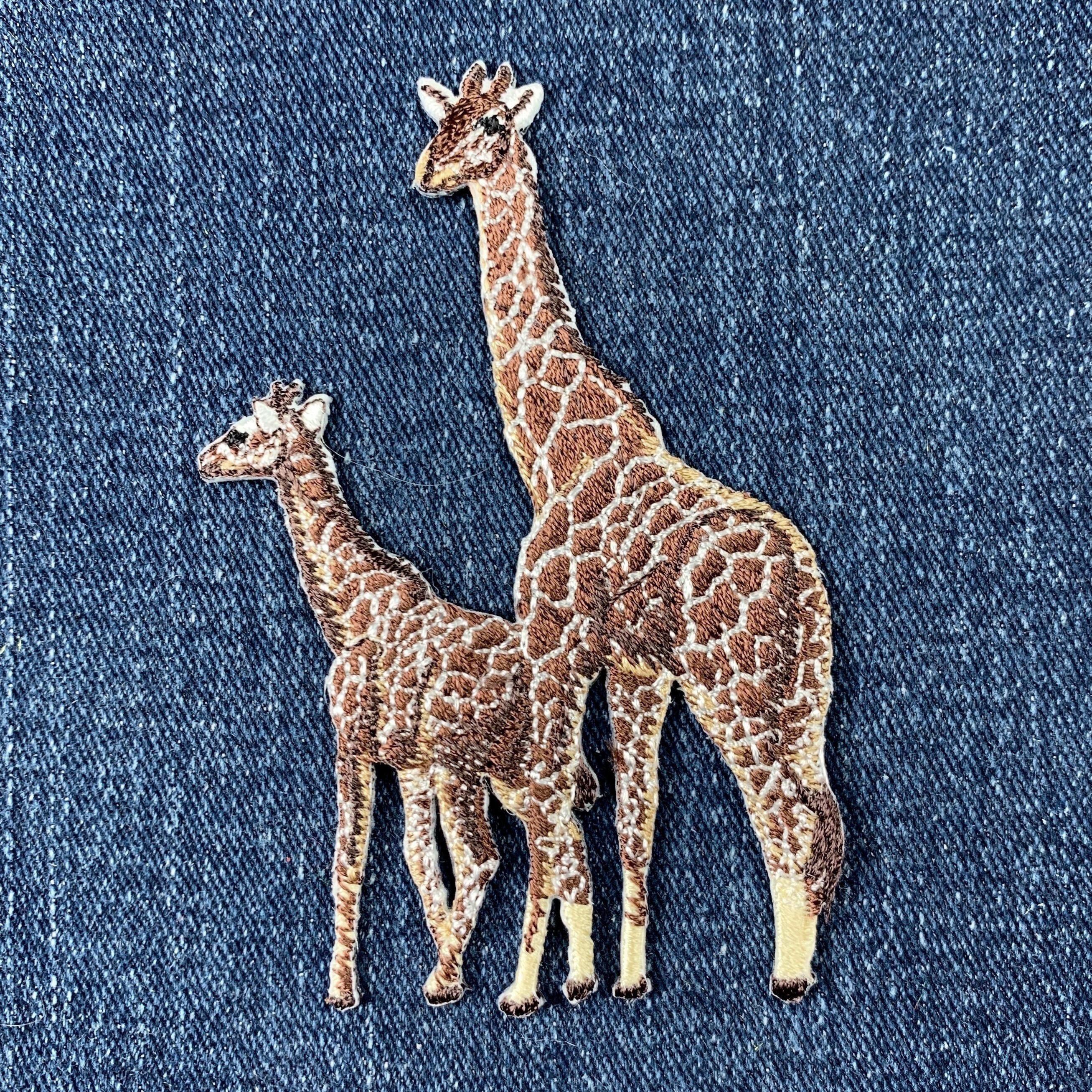 thumbnail interactive-video image 1 of CRS Fur Fabrics Printed Polycotton Craft Fabric – Giraffes – 80% Polyester 20% Cotton – Multicoloured 1 of 5
