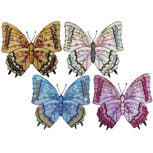 May include: Four embroidered butterfly patches in different colors: yellow, pink, blue, and purple. Each patch features a detailed butterfly design with sequins.