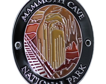 May include: A black and silver metal round pin with a colorful image of Mammoth Cave National Park. The text "Mammoth Cave National Park" is written around the edge of the pin.