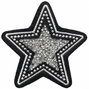 May include: Black felt star-shaped patch with a white outline and a silver rhinestone center.