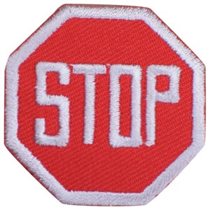 May include: Red octagonal stop sign with a white border and white text that reads "STOP".