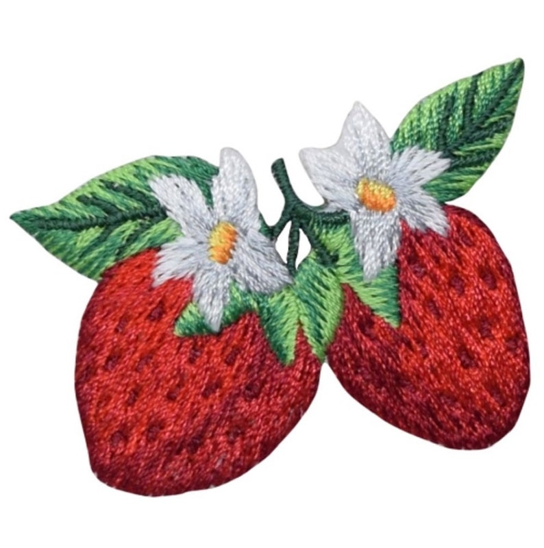 May include: Two embroidered red strawberries with green leaves and white flowers.