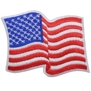May include: A red, white, and blue embroidered American flag patch. The flag is waving in the wind.
