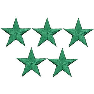 May include: Five green felt star-shaped patches. The stars are approximately 2.5 cm in diameter.