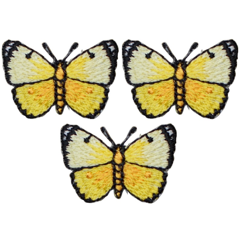 May include: Three yellow embroidered iron-on patches of butterflies. Each butterfly has a light yellow body and dark yellow wings with black outlines.