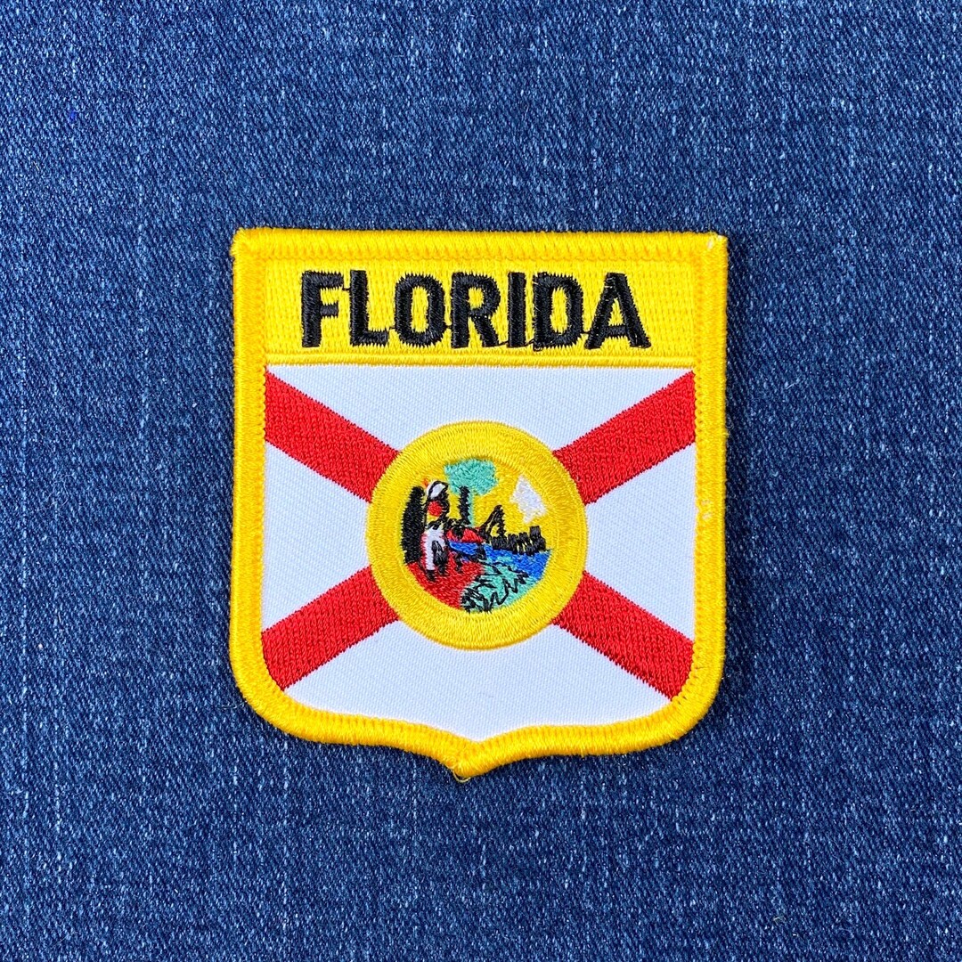 thumbnail image 2 of Florida Flag Patch – Embroidered Shield Badge, 2.75", Iron-On Or Sew-On 2 of 2