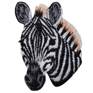 May include: Embroidered patch featuring a zebra head with black and white stripes. The zebra's ears and mane have tan and light brown accents. This patch is suitable for jackets, bags, or other fabric items.