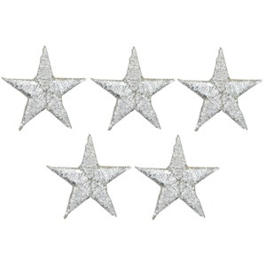 May include: Five silver embroidered star iron-on patches.