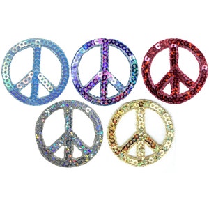 May include: Five peace sign patches with iridescent sequins. The patches are blue, purple, red, silver, and gold.