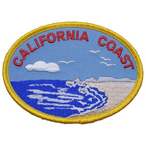 May include: An embroidered patch with a blue and white ocean scene, a white cloud, and three white seagulls. The patch has a yellow border and the text "CALIFORNIA COAST" in red.