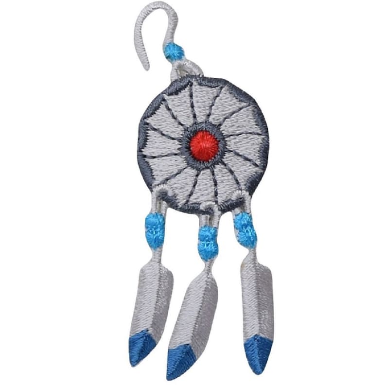 May include: A white dreamcatcher with a grey centre and a red bead. The dreamcatcher has three white feathers with blue tips.