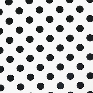 May include: White fabric with a black polka dot pattern. The dots are evenly spaced and cover the entire surface.