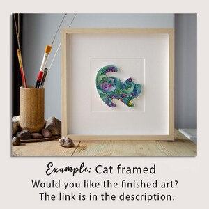 May include: Framed artwork featuring a colorful cat design. The cat is composed of swirling patterns in shades of green, blue, and purple. The artwork is displayed in a light wood frame with a white mat. Text on the image reads: "Example: Cat framed. Would you like the finished art? The link is in the description."