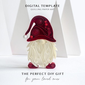 May include: A quilling paper art gnome featuring a deep red hat with intricate coiled patterns and small red accents, a white coiled paper beard, and red coiled paper feet. The text reads DIGITAL TEMPLATE QUILLING PAPER ART THE PERFECT DIY GIFT for your loved ones.