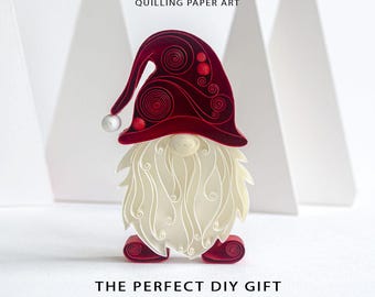 May include: A quilling paper art gnome featuring a deep red hat with intricate coiled patterns and small red accents, a white coiled paper beard, and red coiled paper feet. The text reads DIGITAL TEMPLATE QUILLING PAPER ART THE PERFECT DIY GIFT for your loved ones.