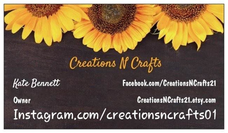 May include: A business card design featuring three bright yellow sunflowers at the top. The text "Creations N Crafts" is in a cursive font. Additional text includes the owner's name, and social media links.