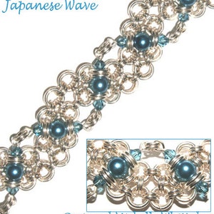 May include: A silver chain bracelet with a Japanese wave design. The bracelet features blue beads and clear crystals.