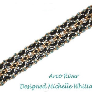 May include: A black, gold, and blue beaded bracelet with a geometric pattern. The bracelet is called "Arco River" and is designed by Michelle Whittaker.