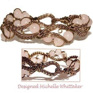 May include: A delicate bracelet made with rose quartz stones and wire wrapped in a bronze color. The bracelet is designed in a woven pattern with the stones set in a circular shape.
