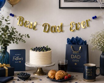 Banderín para el Día del Padre con el mensaje "Mejor papá" y pompones azul real, decoración de pared con frase colgante de agradecimiento para papá nuevo en dorado brillante.