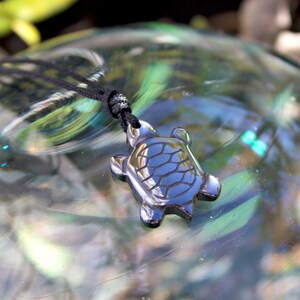 Hematite Turtle Pendant Necklace: Waxed Cord Beach Jewelry.