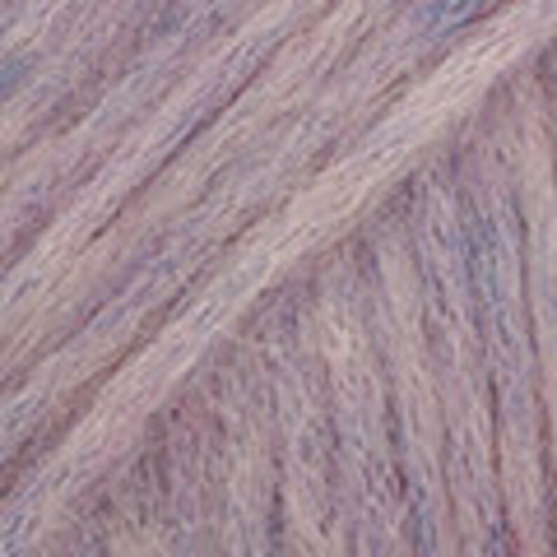 May include: Close-up of a skein of yarn in shades of lavender, light purple, and blue. The yarn appears soft and fluffy, with a slightly textured appearance. The fibers are loosely spun, creating a delicate and airy look, ideal for knitting or crocheting projects.