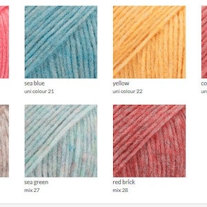 May include: A collection of yarn skeins in various colors, including forest green, rose, sea blue, yellow, coral reef, pink, raspberry, beige, sea green, and red brick. Each skein is labeled with its color name and a corresponding number.