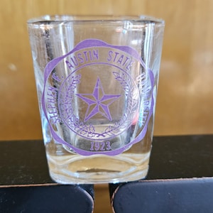 Stephen F Austin State University Shot Glass, Gift, SFA Alumni, Purple Lettering, Lumberjack.  Bin MA