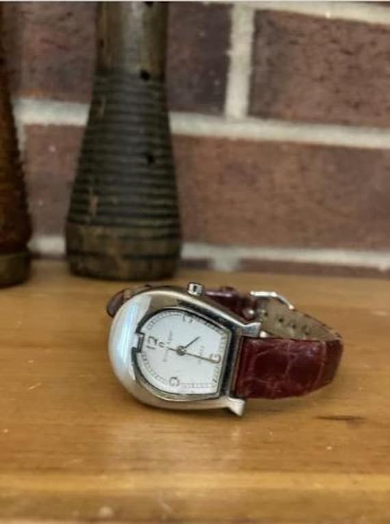 Etienne Aigner Women Wristwatch by Quartz Horseshoe Design with Lizard Watchband Stainless Steel Case. Bin 32