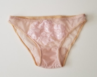 Sheer skin tone pantie with pink lace