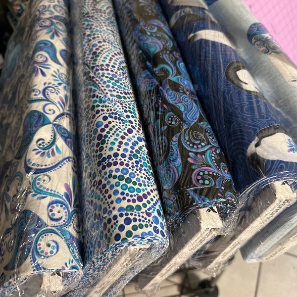 Polar attitude beaded swirls 45”. wide fabric  great for kids quilts and gorgeous.  Blue purple green super cute