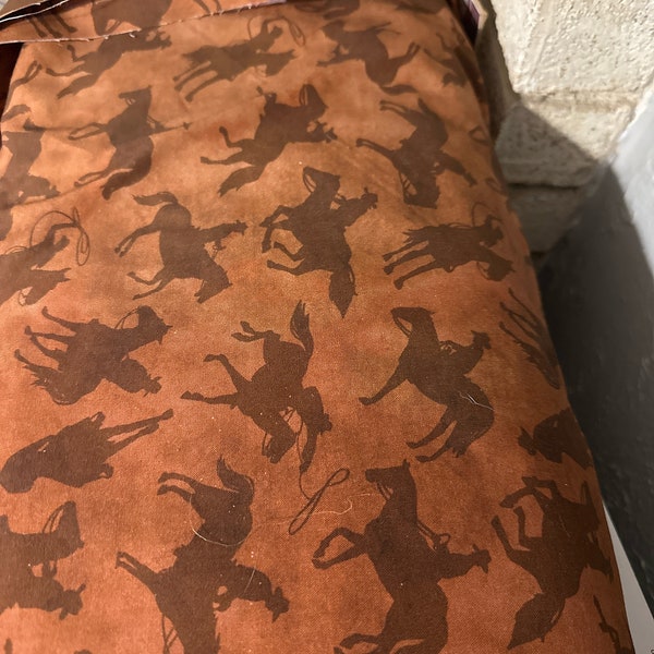 Cowboy saddle brown 108” cotton fabric.  Great for quilts table runner, curtains, aprons, lots of household projects!! Yellowstone
