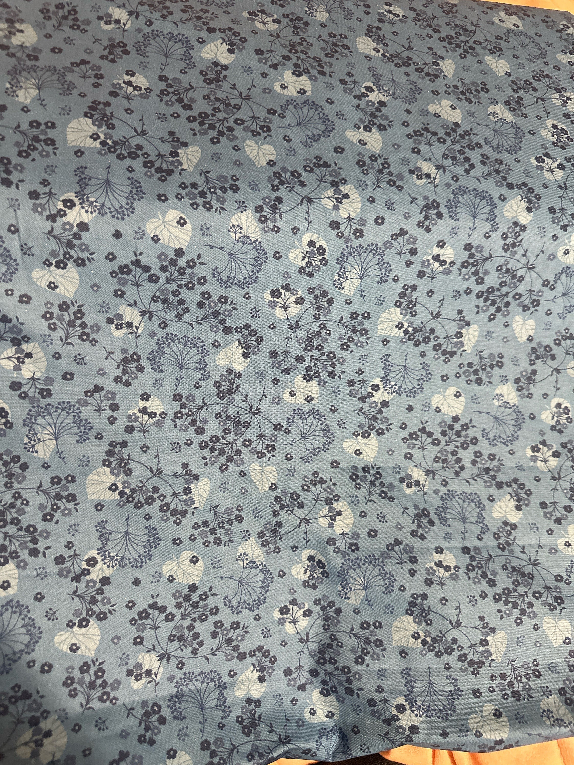 Harmony med blue 108” cotton fabric.  Great for quilt backing table runner, curtains, aprons, lots of household projects!!  With flowers