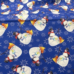 Merry and Bright snowman blue  45”. Cotton fabric snowmen swirl snowflakes broom Benartex medium blue Christmas wall, lap, or cuddle quilt
