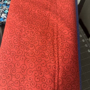 Tilt a whirl red 45” fabric