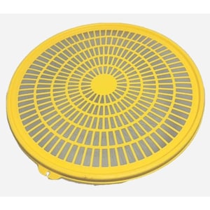 May include: A bright yellow, circular strainer with a grid pattern. The strainer has a raised edge and a central solid circle. The grid design features concentric circles and radial lines, creating a visually appealing and functional kitchen tool.
